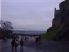 Edge of the castle with the city in the background.