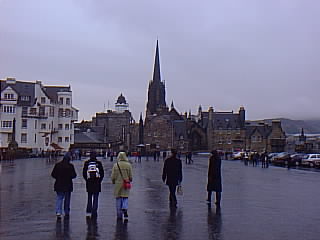 Molly, Lisa and Sharon walking away from the castle towards the Royal Mile.