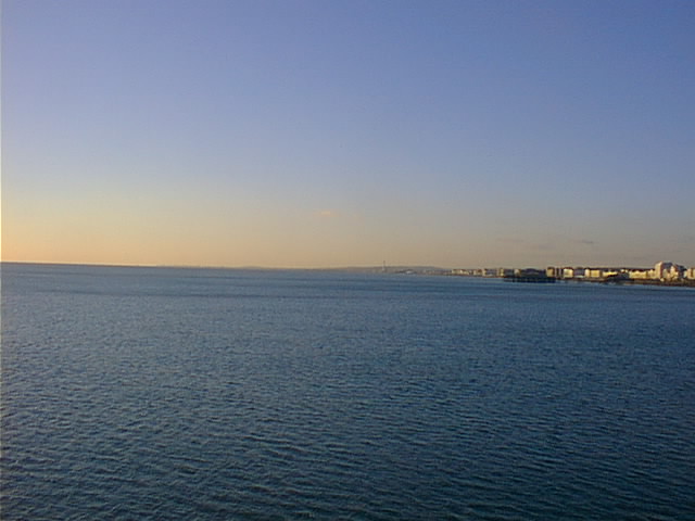 View West from Palace Pier looking at West Pier and Hove and Shoreham amd beyond.